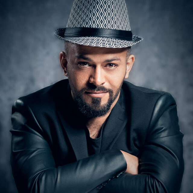 artistic professional man portrait with hat photo