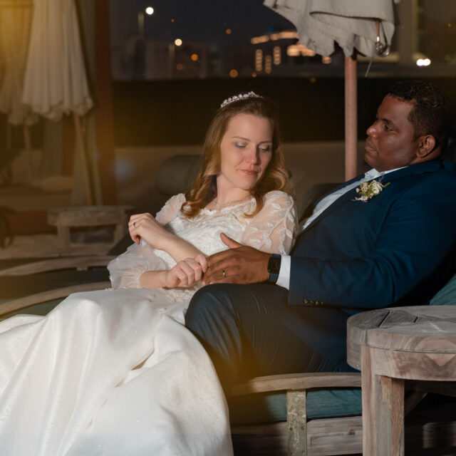 wedding-beach-night-bride-moment-groom-lap