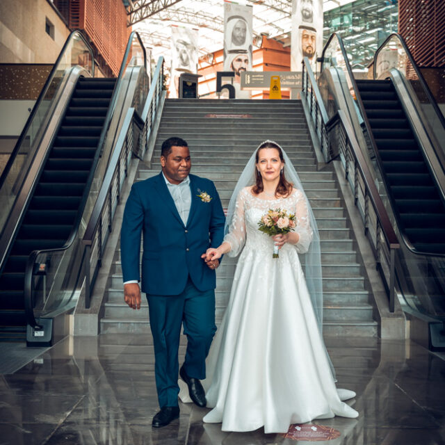 wedding-indoor-holding-hands-walking-forward-pose